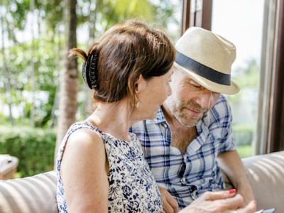 Couple waiting in a hotel lobby